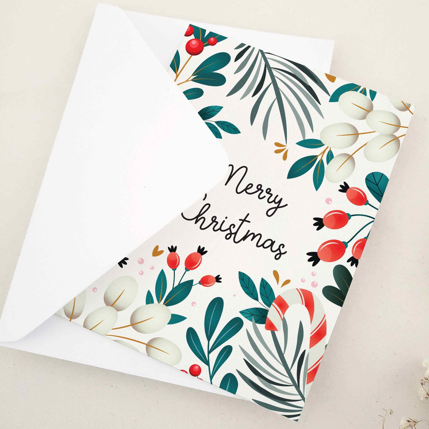 Share the warmth and joy of the holiday season with our beautiful 'Merry Christmas' card, featuring an elegant array of festive motifs including mistletoe, berries, and candy canes against a traditional winter backdrop, a perfect canvas for sending your holiday wishes.