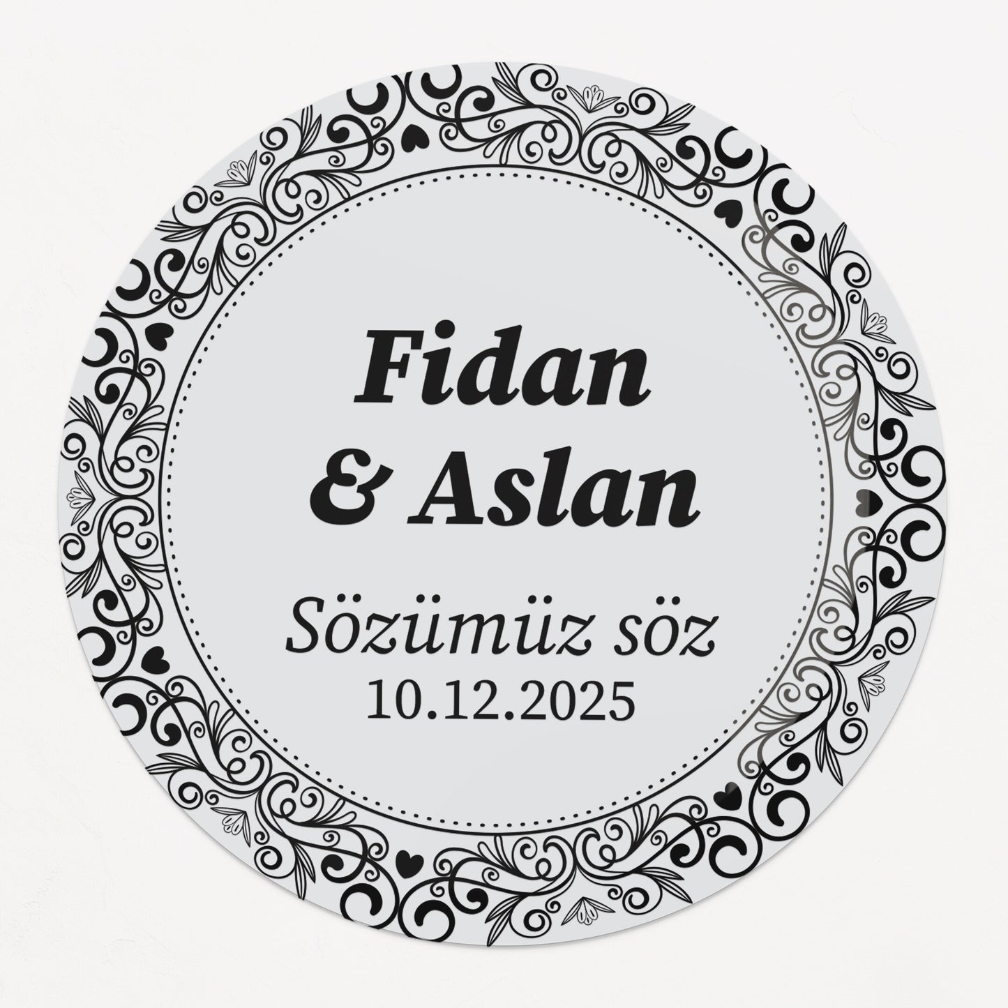Personalized gold-foil commitment sticker with names, message, and date