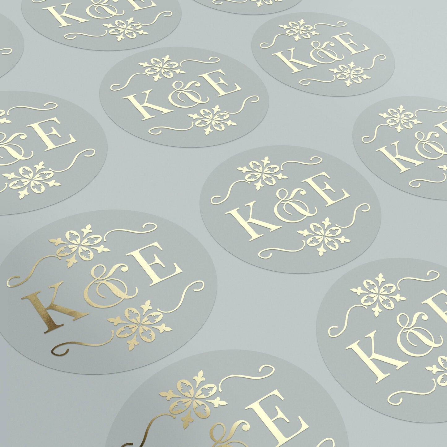 Transparent monogrammed wedding sticker with gold ornaments design and custom initials