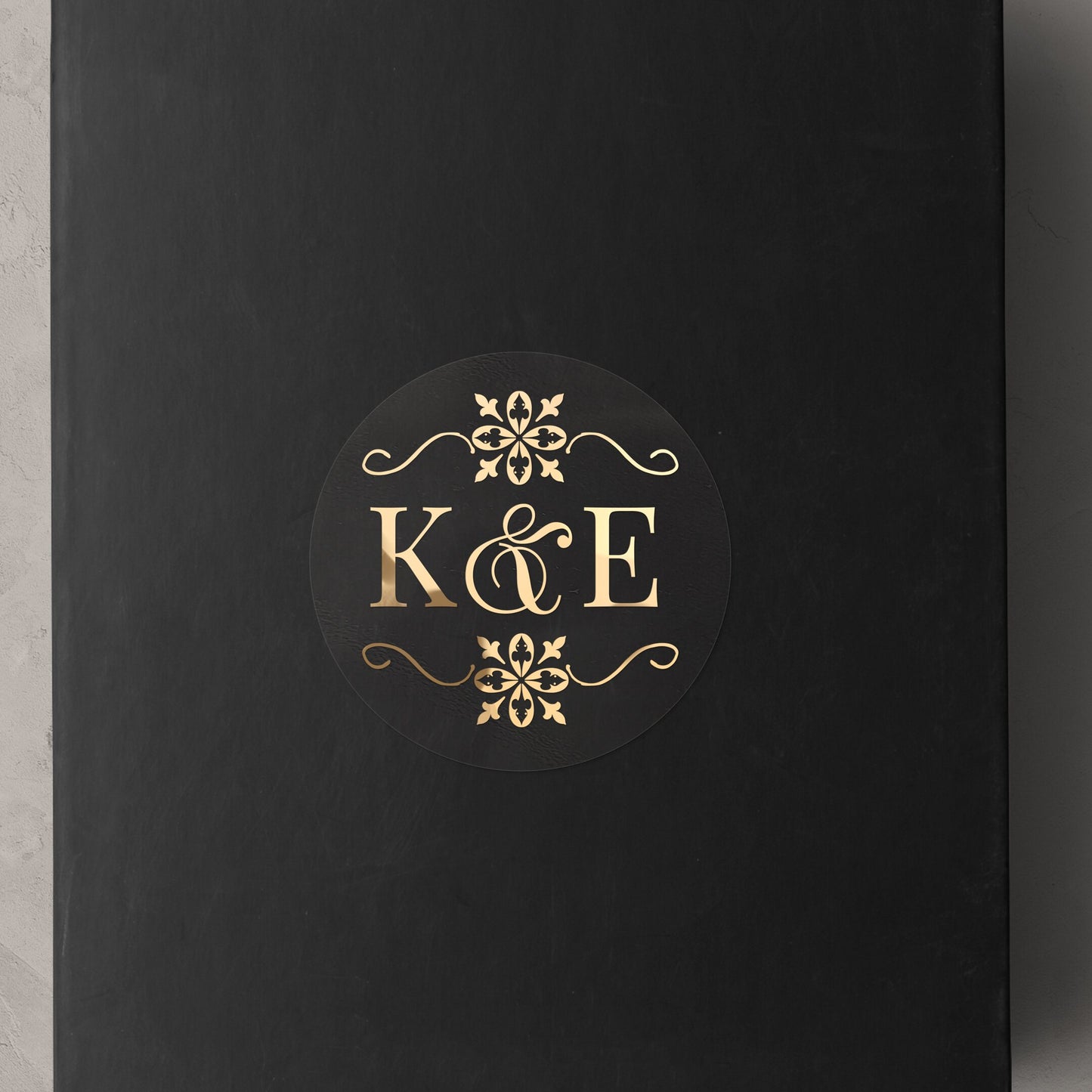 Transparent monogrammed wedding sticker with gold ornaments design and custom initials