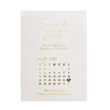 Modern vellum Save the Date printed in metallic gold foil, featuring elegant serif and script lettering with minimalist calendar design on frosted translucent paper, ideal for luxury wedding stationery collections – XOXOKristen