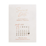 Personalized vellum Save the Date featuring rose gold foil printing on translucent frosted paper, with modern calendar layout and minimalist typography, perfect for romantic and contemporary weddings – XOXOKristen