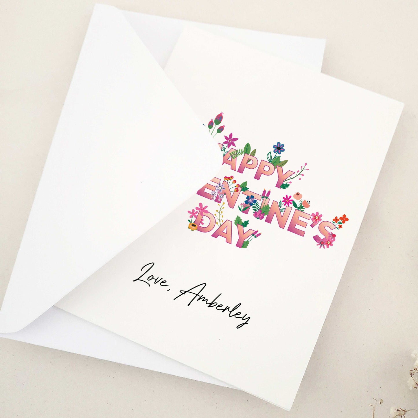 Celebrate Valentine's Day with our stunning Happy Valentine's Day cards, perfect for sharing heartfelt wishes with your best friend, girlfriend, or boyfriend. The design features an elegant blend of floral elements, bold typography, and calligraphy-style signature, symbolizing love and affection.