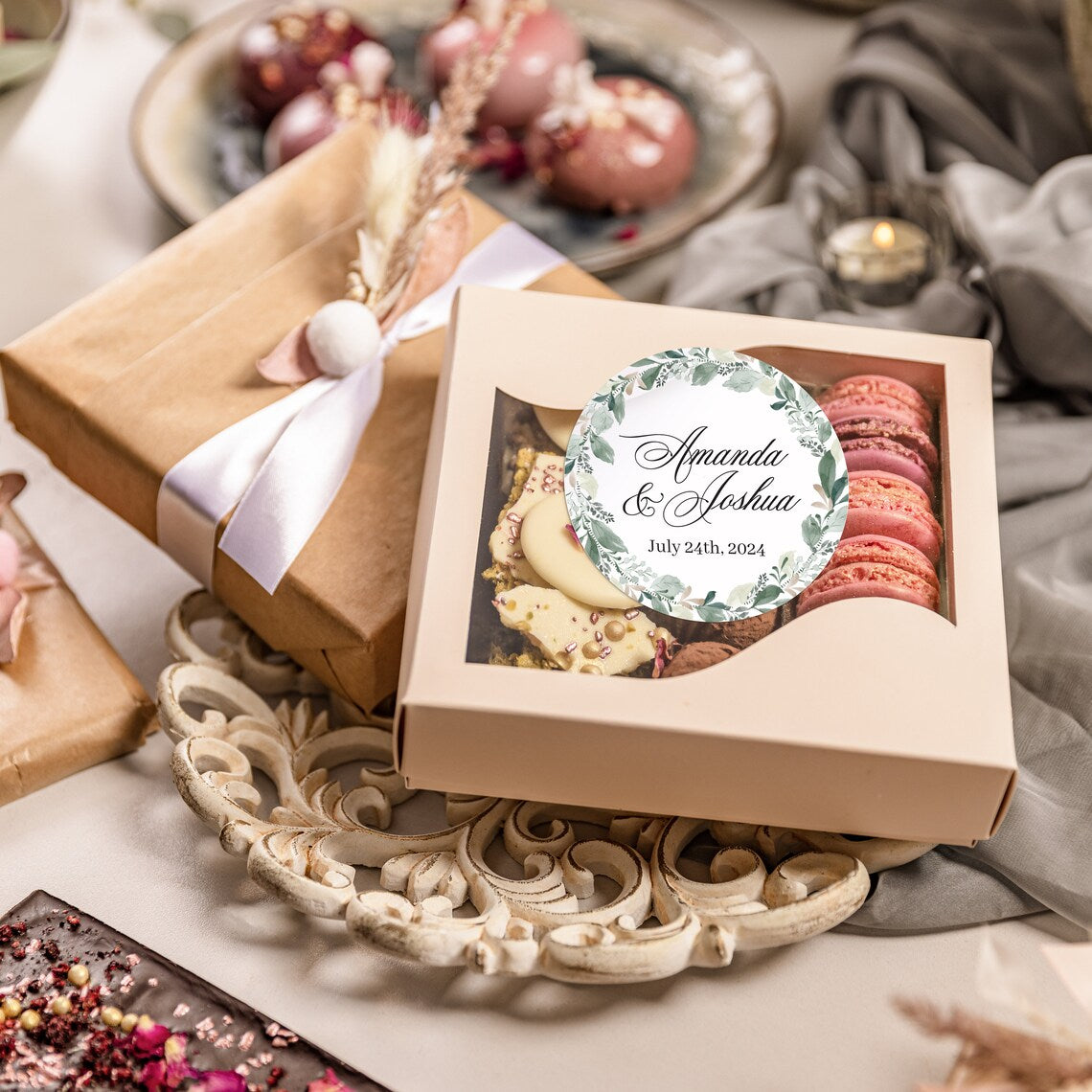 Elegant wedding sticker with genery wreath, personalized with names and wedding date.