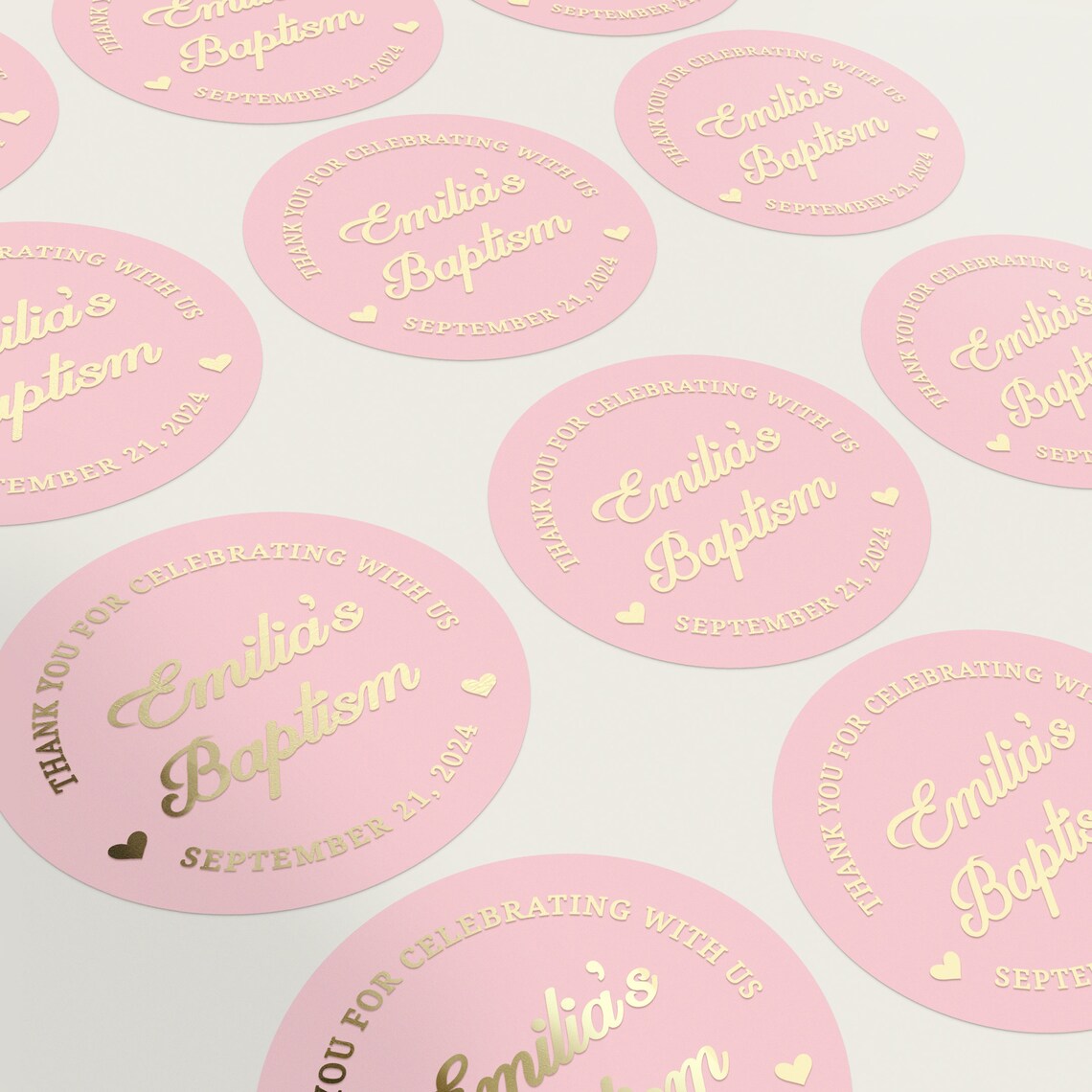 personalized pink and gold baptism stickers with named and date, and text reading Thank you for celebrating with us.