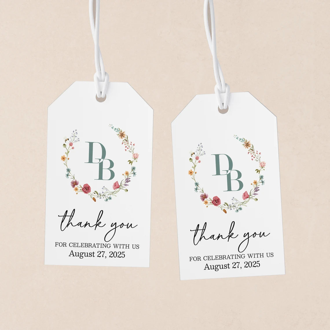Elegant personalized monogram wedding favor tags with watercolor wildflowers wreath.