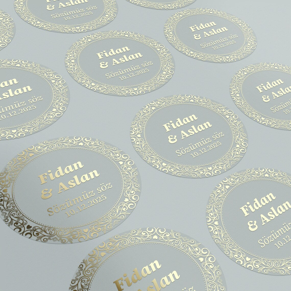 Personalized gold-foil commitment sticker with names, message, and date