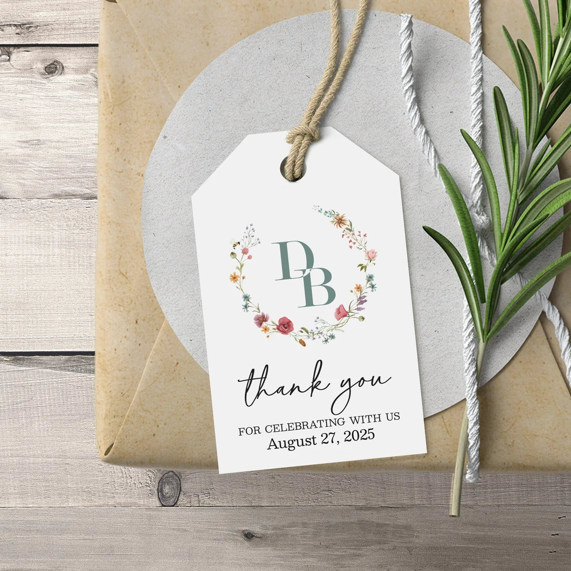 Elegant personalized monogram wedding favor tags with watercolor wildflowers wreath.