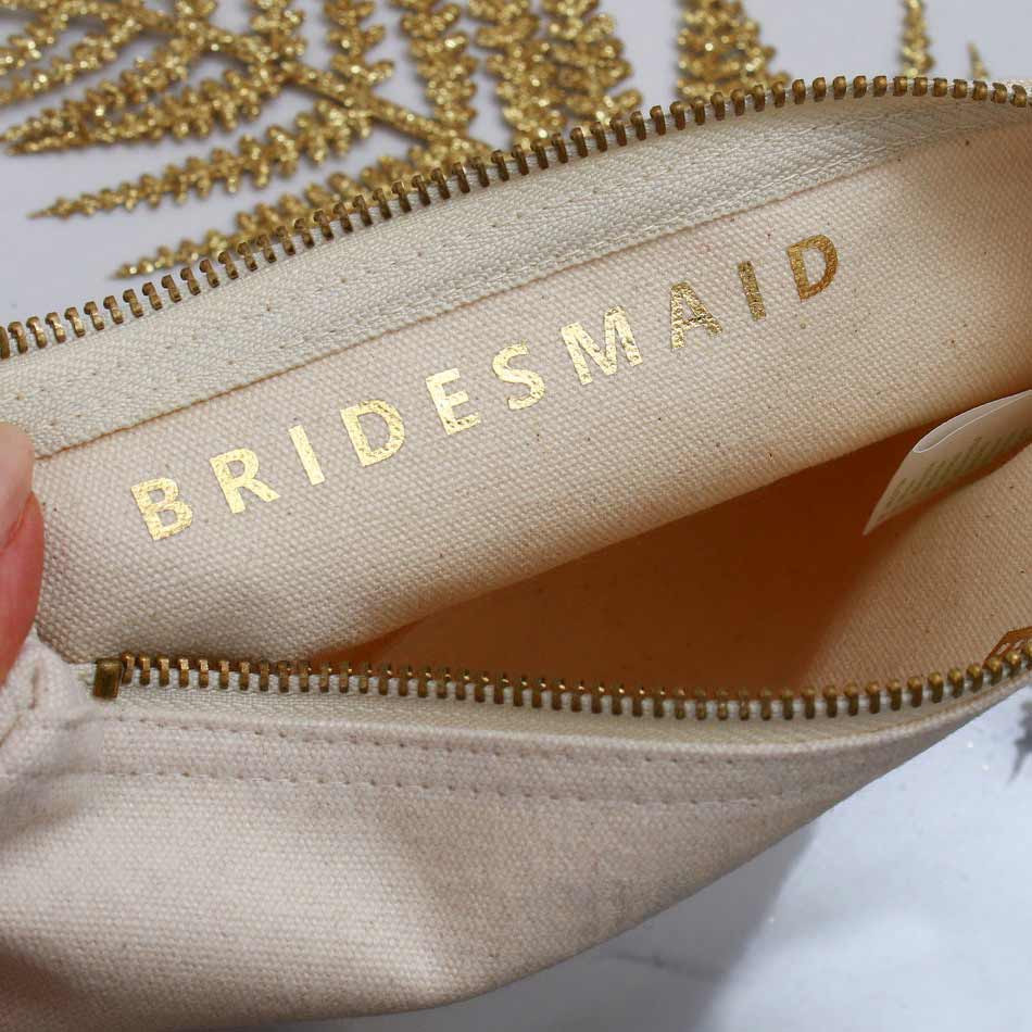 Personalized bridesmaid gift cosmetic pouch with handwritten golf foiled wedding role. Customize for maid of honor, bridesmaid or other custom role - XOXOKristen
