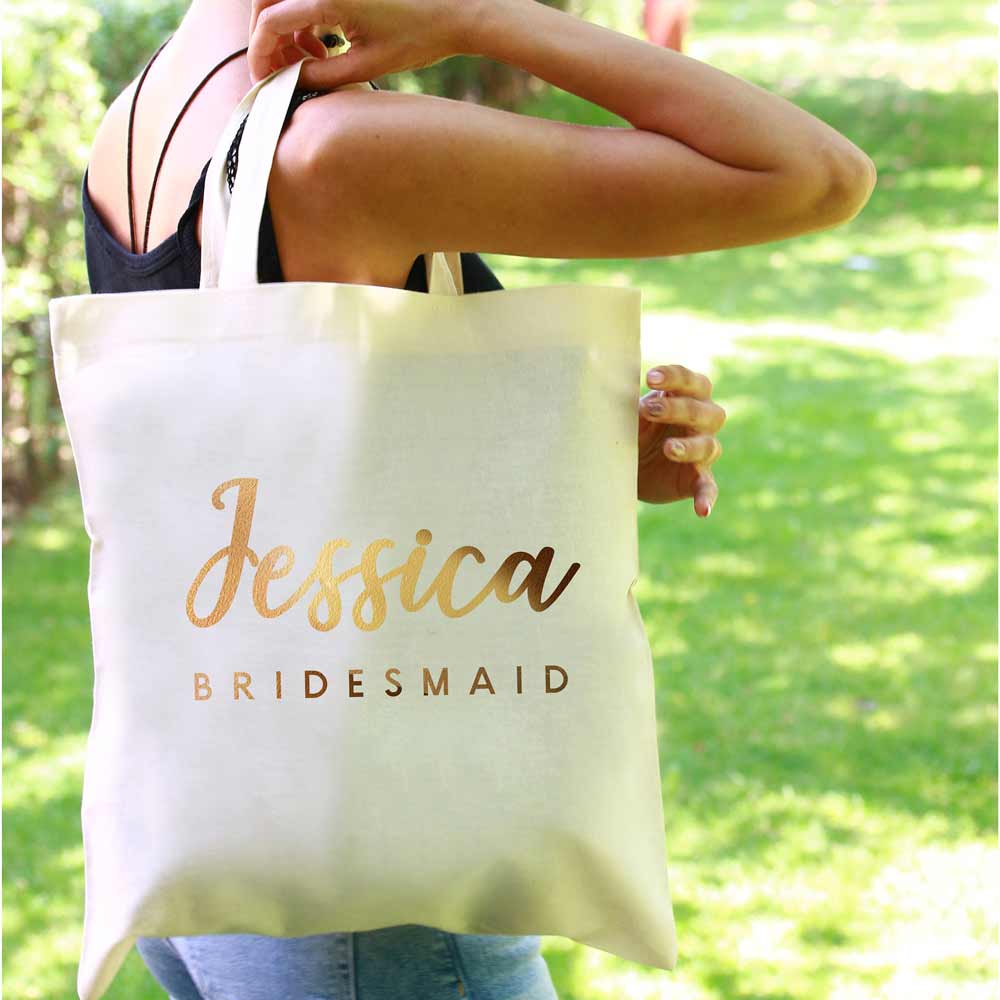 Personalized bridesmaid tote bag with gold foiled handwritten name. Customizable for as maid of honor, flower girl, matron of honor or other custom wedding roles – XOXOKristen