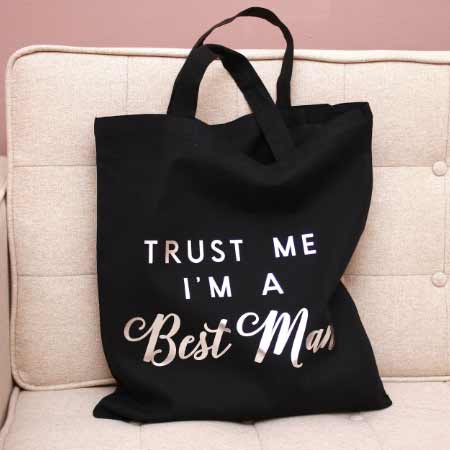 Personalized groomsman tote bag with gold foiled handwritten wedding role. Customizable for groomsman, best man or usher - XOXOKristen