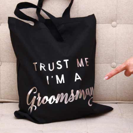 Personalized groomsman tote bag with gold foiled handwritten wedding role. Customizable for groomsman, best man or usher - XOXOKristen