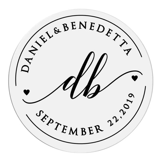 Custom wedding sticker with monogram initials and heart accents. Entirely personalized clear labels. 