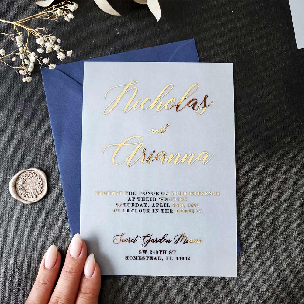 Elegant vellum wedding invitations with gold foiled print - XOXOKristen