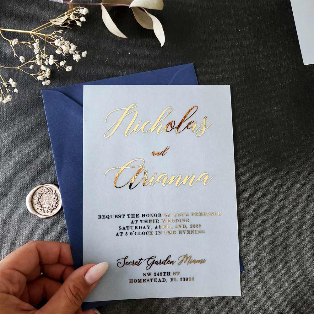 Elegant vellum wedding invitations with gold foiled print - XOXOKristen