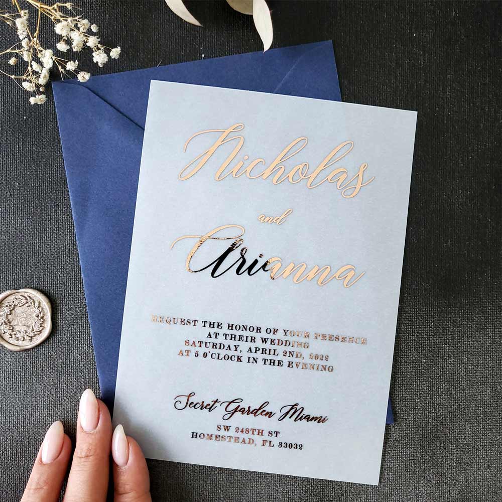 Elegant vellum wedding invitations with gold foiled print - XOXOKristen