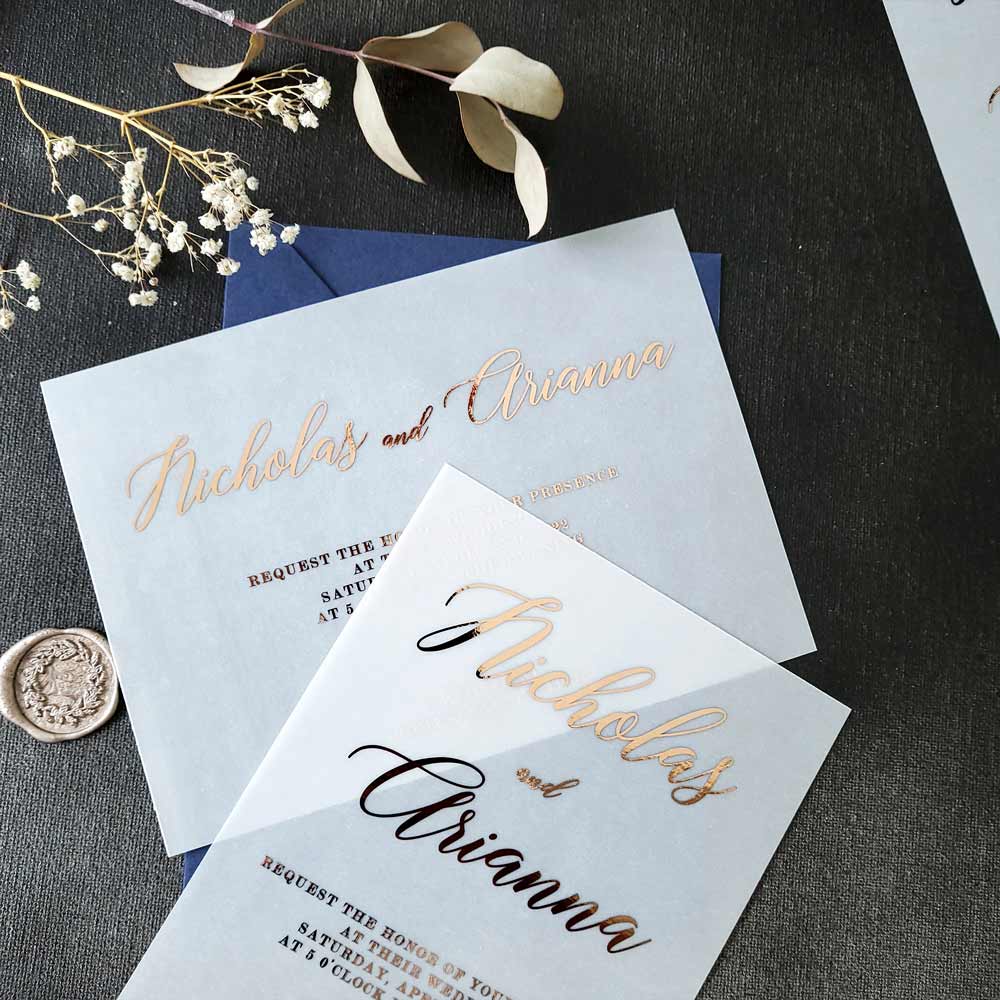 Elegant vellum wedding invitations with gold foiled print - XOXOKristen