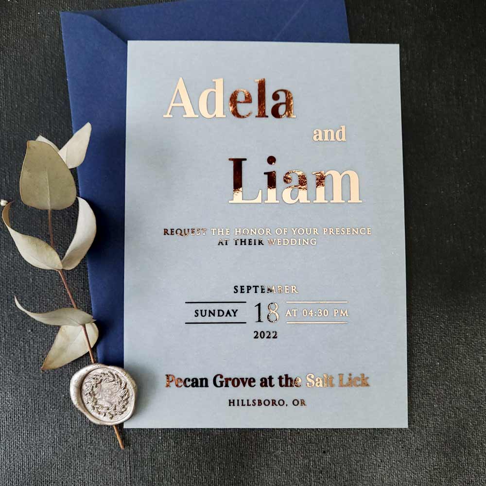 Elegant vellum wedding invitations with gold foiled writing - XOXOKristen