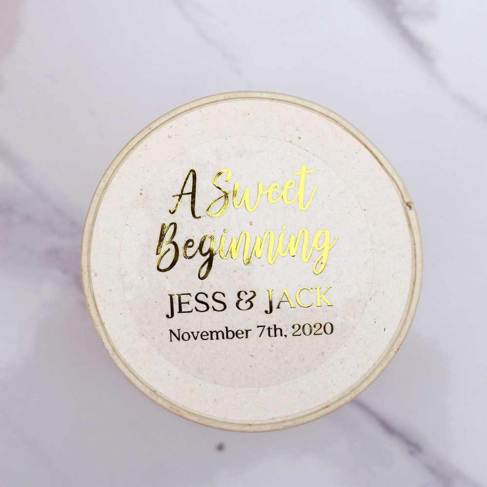 Custom wedding sweet beginnings sticker with real gold foiled lettering. Entirely personalized clear labels.