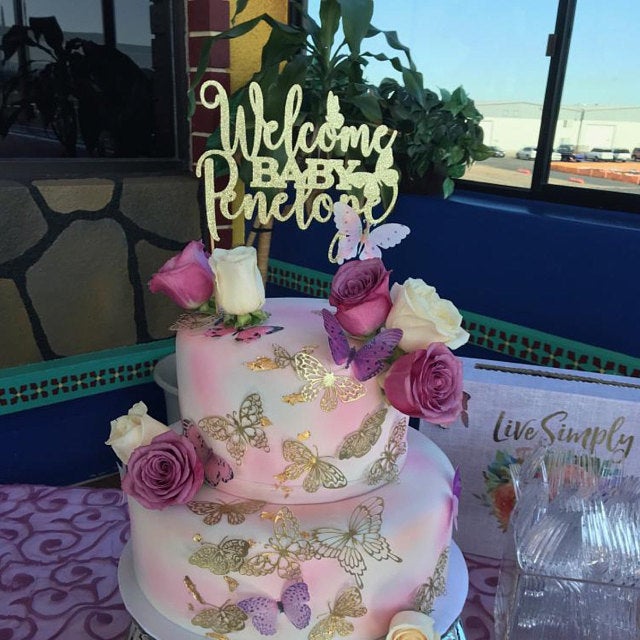 Personalized baby shower Welcome baby cake topper with butterflies. Gold glittered cake decoration for baby shower, baptism or christening ā XOXOKristen.