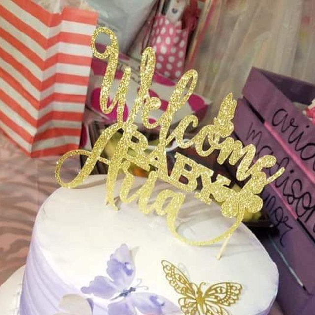 Personalized baby shower Welcome baby cake topper with butterflies. Gold glittered cake decoration for baby shower, baptism or christening ā XOXOKristen.