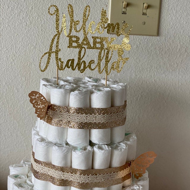 Personalized baby shower Welcome baby cake topper with butterflies. Gold glittered cake decoration for baby shower, baptism or christening ā XOXOKristen.