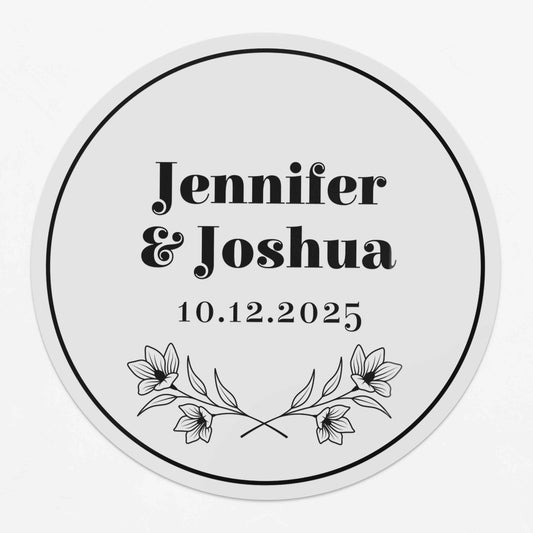 Personalized wedding sticker with bold names, date, and floral branches on clear background