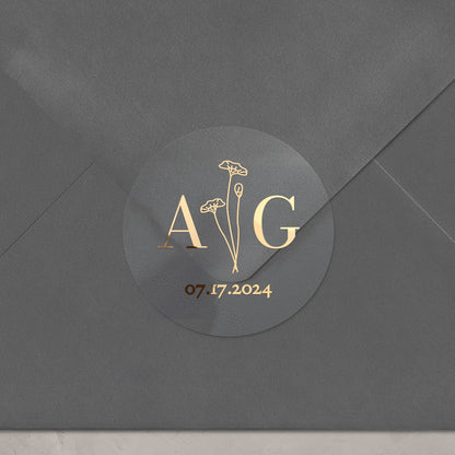 Elegant transparent sticker with initials, date and flowers for wedding invitations, seals and favors.