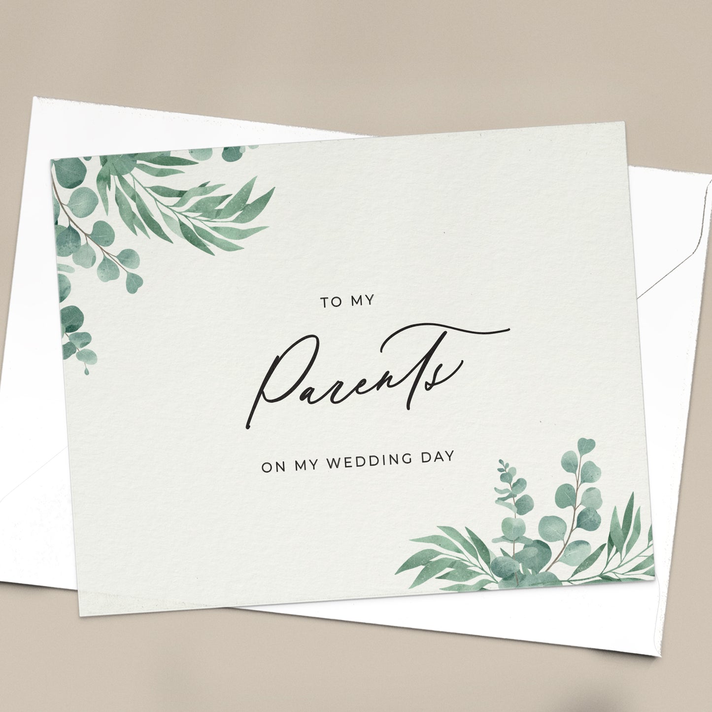 To my parents on my wedding day note card in greenery design with eucalyptus leaves and calligraphy font from XOXOKristen.