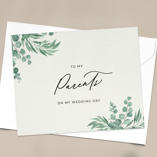 To my parents on my wedding day note card in greenery design with eucalyptus leaves and calligraphy font from XOXOKristen.