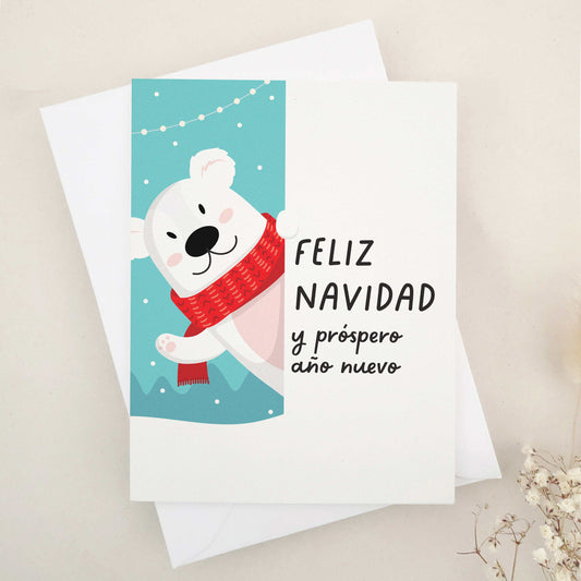 Charming 'Feliz Navidad y próspero año nuevo' card featuring a joyful illustration of a polar bear skating into the festive season, symbolizing the merriment and playful spirit of the holidays. The imagery beautifully blends Christmas happiness with the lively anticipation of New Year's celebrations, ideal for extending heartfelt holiday greetings to loved ones.
