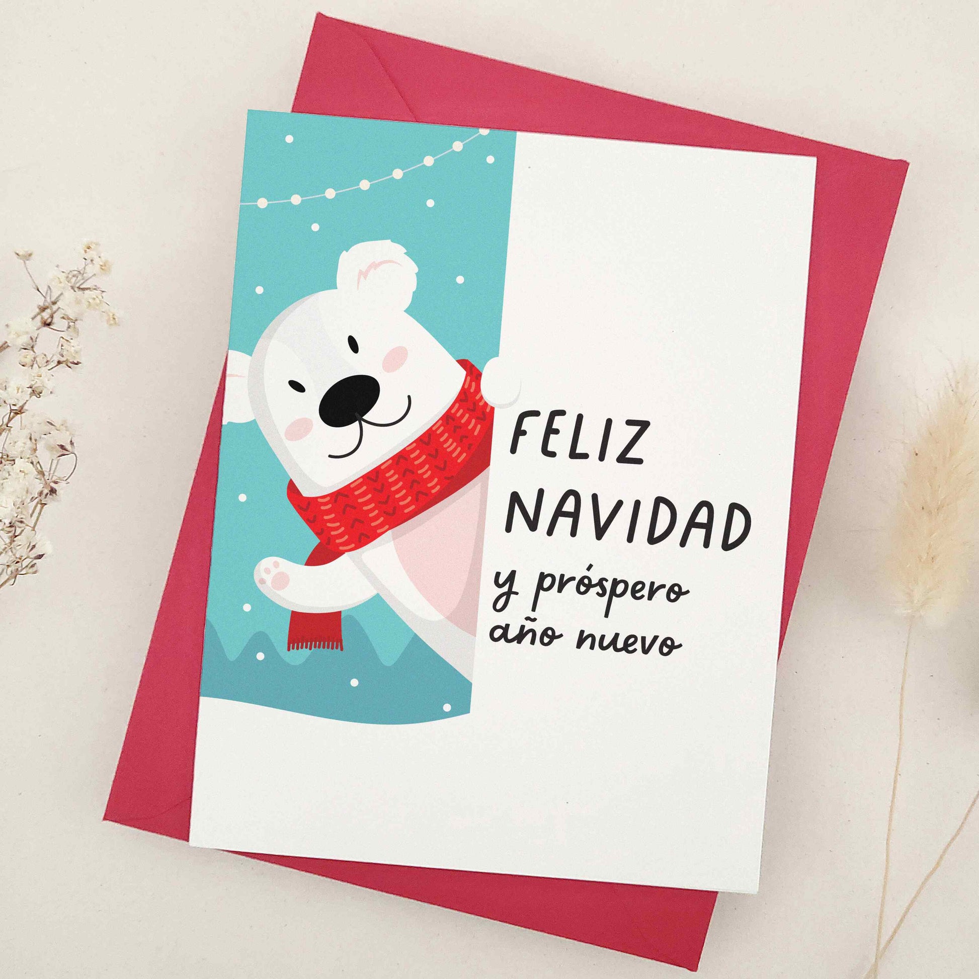 Charming 'Feliz Navidad y próspero año nuevo' card featuring a joyful illustration of a polar bear skating into the festive season, symbolizing the merriment and playful spirit of the holidays. The imagery beautifully blends Christmas happiness with the lively anticipation of New Year's celebrations, ideal for extending heartfelt holiday greetings to loved ones.