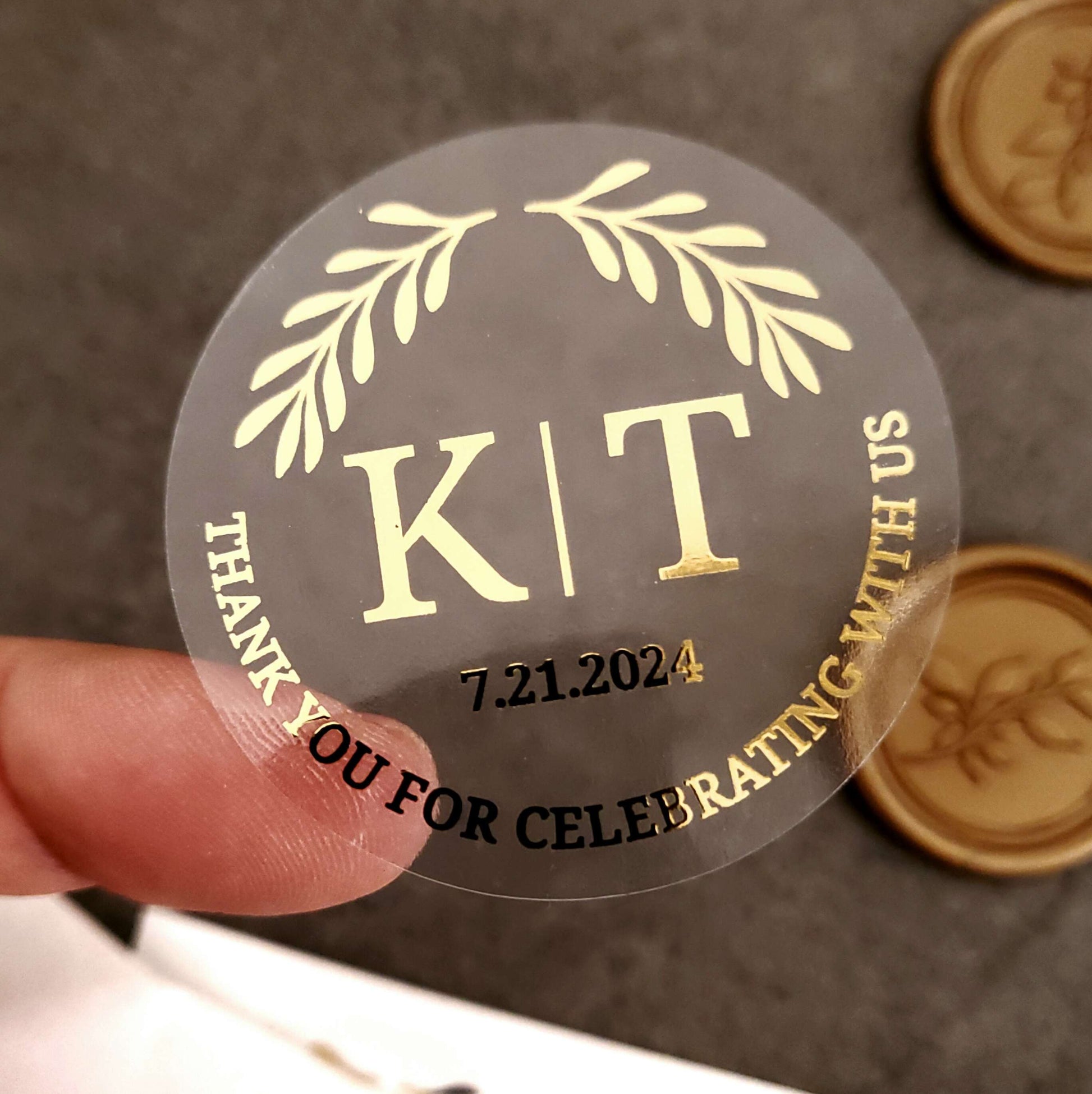 Elegant personalized wedding thank you sticker with custom initials and date.
