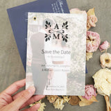 Classic vellum save-the-date photo card with custom monogram, elegant typography, and minimalist text printed on semi-transparent vellum paper, backed with a photo print.