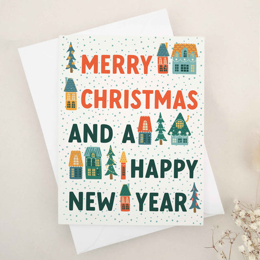 Merry Christmas and a Happy New Year card by XOXOKristen, featuring a picturesque winter village scene with quaint houses and evergreen trees, adorned with vivid colors and whimsical imagery, embodying festive cheer and hopeful spirit.