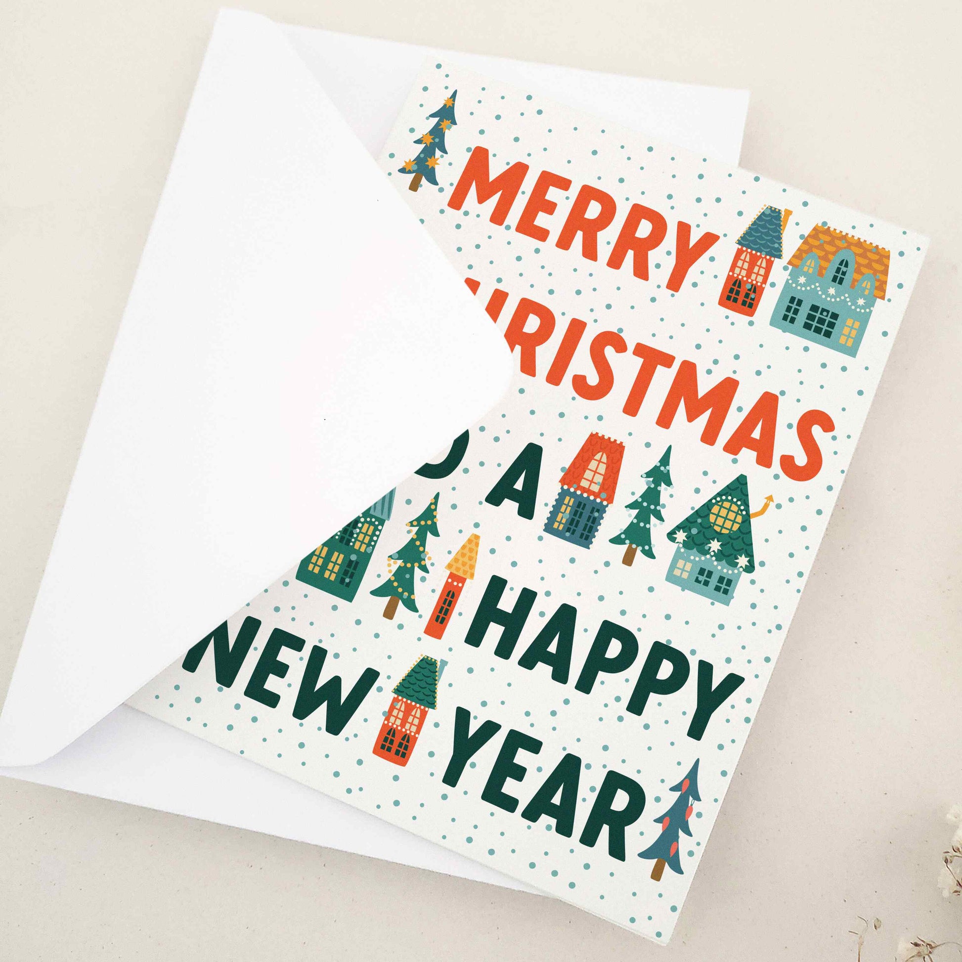 Merry Christmas and a Happy New Year card by XOXOKristen, featuring a picturesque winter village scene with quaint houses and evergreen trees, adorned with vivid colors and whimsical imagery, embodying festive cheer and hopeful spirit.