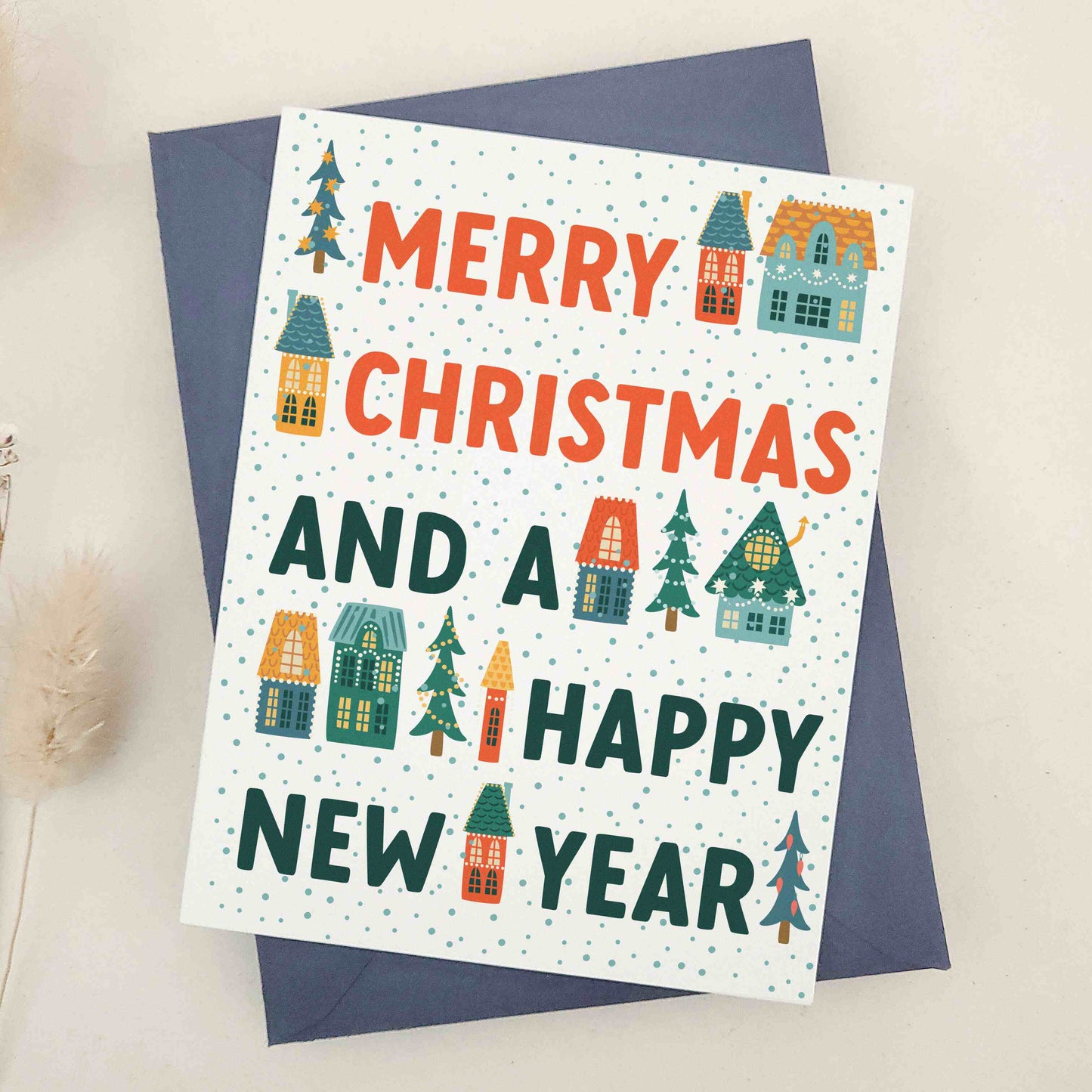 Merry Christmas and a Happy New Year card by XOXOKristen, featuring a picturesque winter village scene with quaint houses and evergreen trees, adorned with vivid colors and whimsical imagery, embodying festive cheer and hopeful spirit.