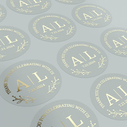 Thank You celebration sticker with gold initials and date with floral decorations. 