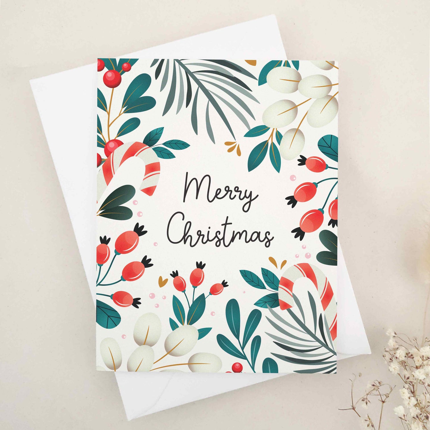 Share the warmth and joy of the holiday season with our beautiful 'Merry Christmas' card, featuring an elegant array of festive motifs including mistletoe, berries, and candy canes against a traditional winter backdrop, a perfect canvas for sending your holiday wishes.