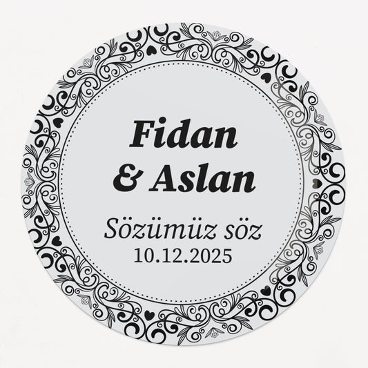 Personalized gold-foil commitment sticker with names, message, and date