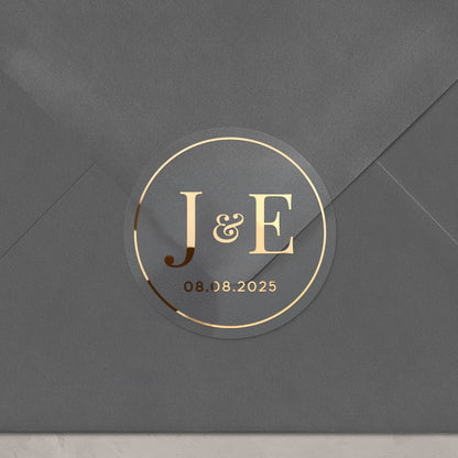 Elegant clear wedding sticker with monogram initials and custom wedding date. 