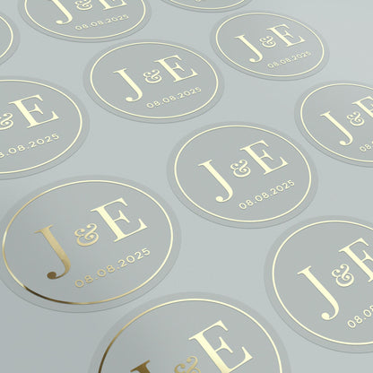 Elegant clear wedding sticker with monogram initials and custom wedding date. 