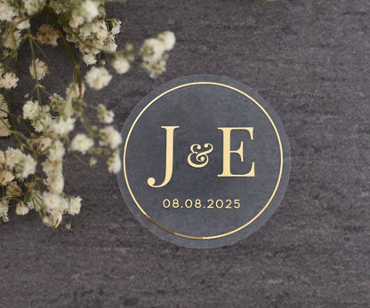 Elegant clear wedding sticker with monogram initials and custom wedding date. 