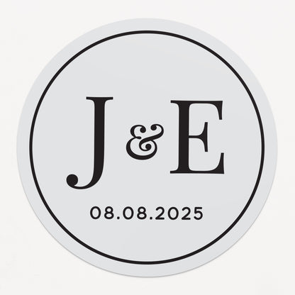 Elegant clear wedding sticker with monogram initials and custom wedding date. 