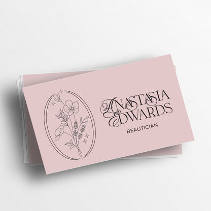 Custom floral-designed business cards with gold text on a white backgroun-XOXOKristen