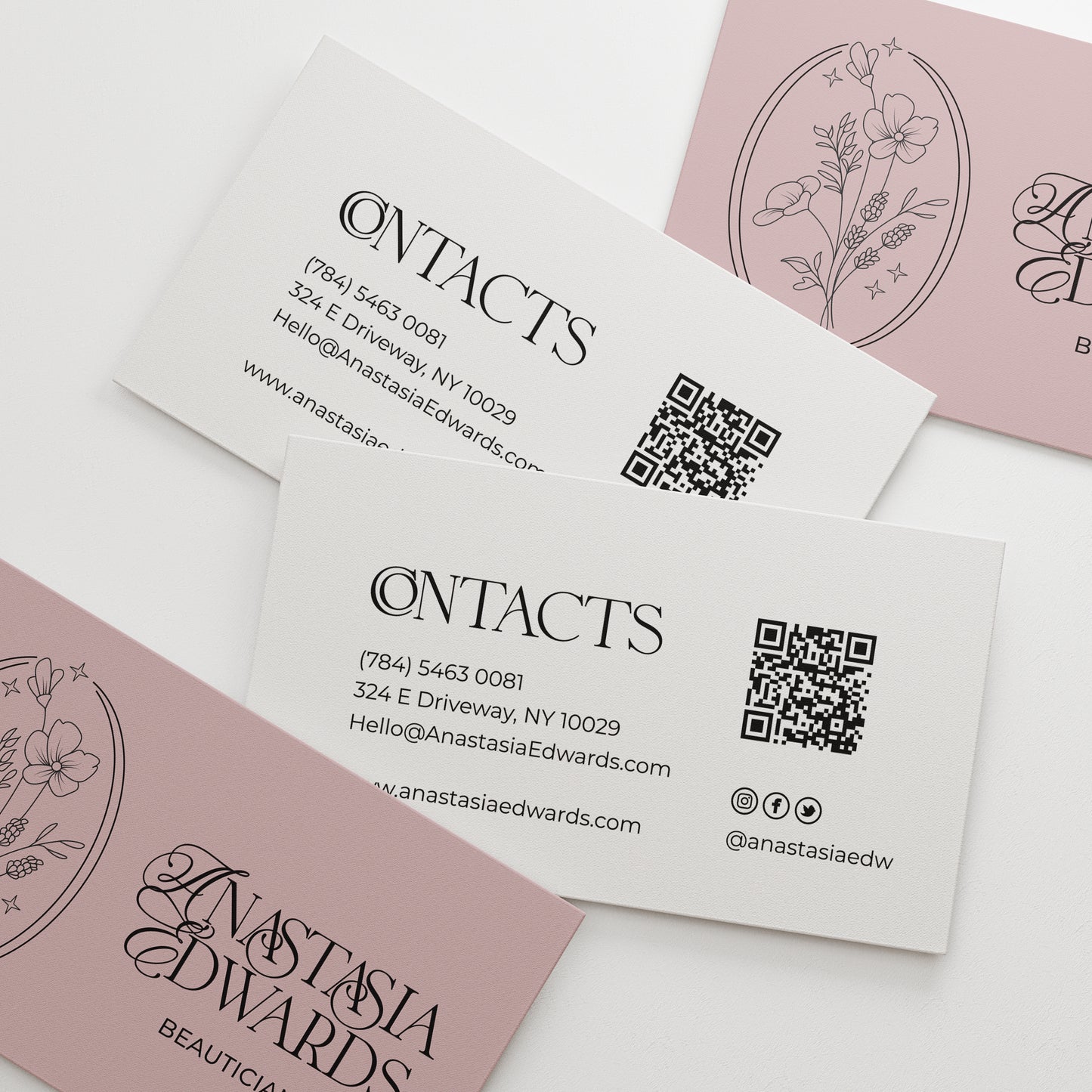 Custom floral-designed business cards with gold text on a white backgroun-XOXOKristen