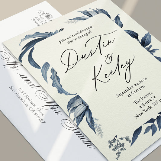 wedding invitations with navy blue floral leaves and calligraphy font - XOXOKristen
