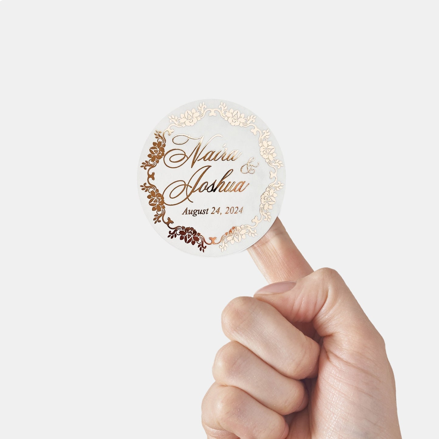 elegant wedding favor stickers with gold foiled flower frame, personalized with names and wedding date. 