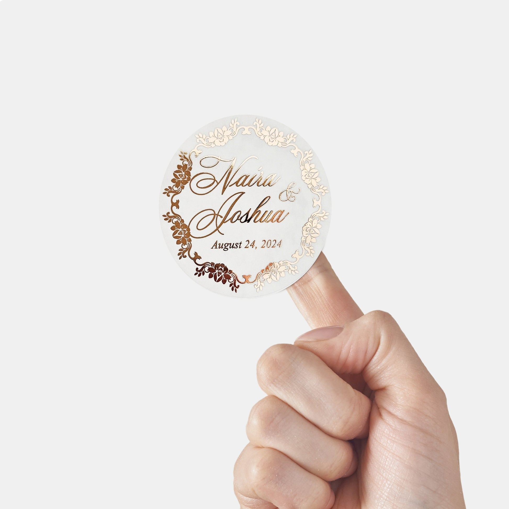 elegant wedding favor stickers with gold foiled flower frame, personalized with names and wedding date. 