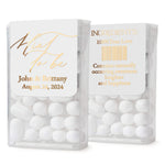 XOXOKristen wedding favor mint box label in elegant gold foil script and serif print, applied to a clear box with white mints – XOXOKristen